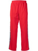 Ports V pantalon de jogging à rayures latérales - Rouge
