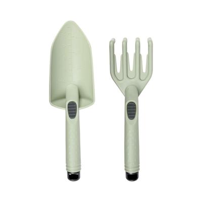Tuingereedschap set - 2-delig - groen - kunststof - hark en schep - handgereedschap