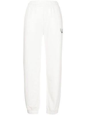 Lacoste pantalon de jogging à logo imprimé - Blanc