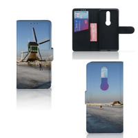 Nokia 4.2 Flip Cover Schaatsers - thumbnail