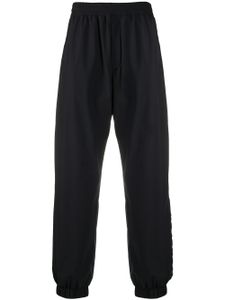 Moncler pantalon de jogging à coupe ample - Noir