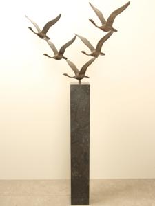5 bronzen zwanen