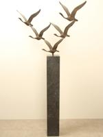 5 bronzen zwanen