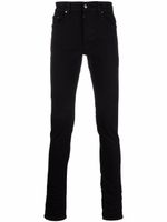 AMIRI jean skinny à plaque logo - Noir