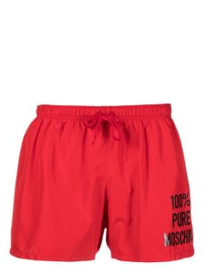 Moschino short de bain à logo imprimé - Rouge