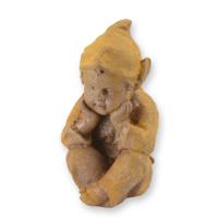 A RUSTY CAST IRON FIGURINE OF A SITTING GNOME