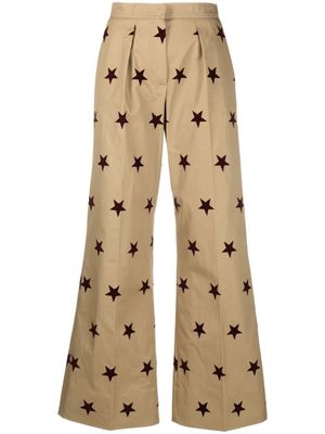 Palm Angels pantalon de tailleur ample à étoiles imprimées - Tons neutres