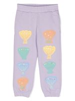 Stella McCartney Kids pantalon de jogging à imprimé coquillage - Violet