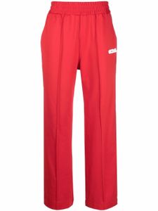 GCDS pantalon de jogging à logo imprimé - Rouge