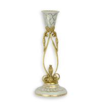 A BRONZE MOUNTED PORCELAIN CANDLE-STICK A BRONZE MOUNTED PORCELAIN CANDLE-STICK