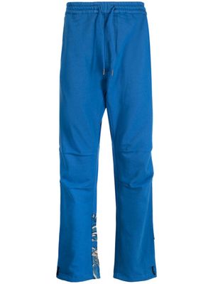Maharishi pantalon en coton à imprimé graphique - Bleu
