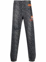 Heron Preston pantalon de jogging à motif abstrait - Noir