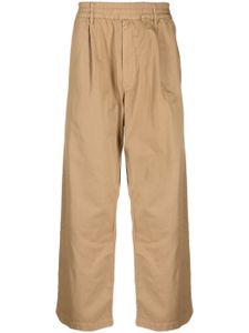 Undercoverism pantalon en coton à coupe ample - Tons neutres