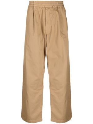 Undercoverism pantalon en coton à coupe ample - Tons neutres