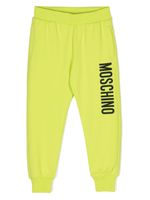 Moschino Kids pantalon de jogging à logo imprimé - Vert