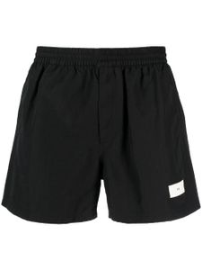 Y-3 short de sport à logo imprimé - Noir