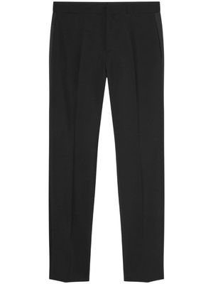 Versace pantalon cargo à logo appliqué - Noir