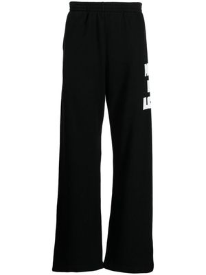 Natasha Zinko pantalon de jogging cœur imprimé - Noir