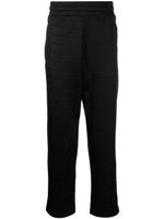 Moschino pantalon à logo imprimé - Noir