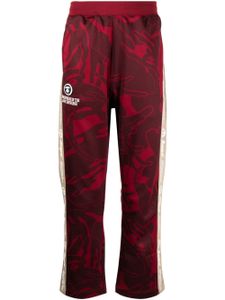 AAPE BY *A BATHING APE® pantalon à imprimé graphique - Rouge