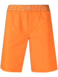 Versace short de bain à détail Greca - Orange