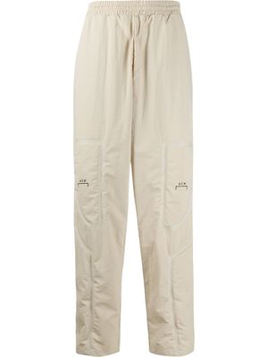 A-COLD-WALL* pantalon de jogging Bracket Taped à empiècements contrastants - Tons neutres