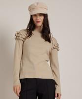 trui met ruches en knopen