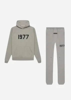 Fear Of God Essentials 1977 Trainingspak Heren Grijs - Maat M - Kleur: Grijs | Soccerfanshop