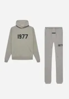 Fear Of God Essentials 1977 Trainingspak Heren Grijs - Maat M - Kleur: Grijs | Soccerfanshop