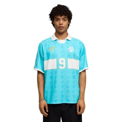 PUMA Olympique Marseille KING T-Shirt Retro Lichtblauw Wit Goud PUMA Olympique Marseille KING T-Shirt Retro Lichtblauw Wit Goud