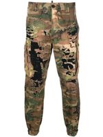 DSQUARED2 pantalon clouté à motif camouflage - Marron