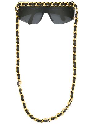 CHANEL Pre-Owned lunettes de soleil à détail de chaine - Noir