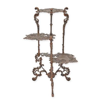 A CAST IRON 3 TIER FLOWER TABLE, BROWN