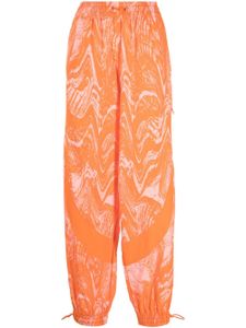 adidas by Stella McCartney pantalon de jogging imprimé - Rose