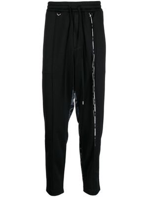 Mastermind World pantalon de jogging à imprimé camouflage - Noir