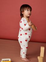 Biologisch katoenen baby pyjama PETIT BATEAU wit hartjesprint