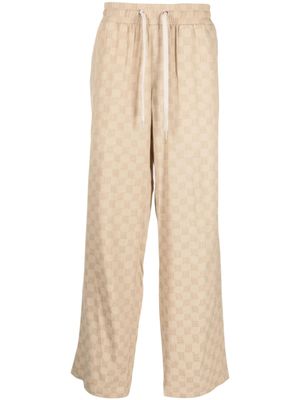 MISBHV pantalon ample à logo imprimé - Tons neutres
