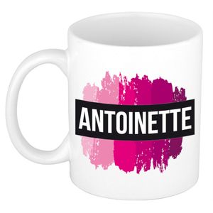 Naam cadeau mok / beker Antoinette  met roze verfstrepen 300 ml   -
