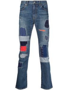 Junya Watanabe MAN jean slim à design patchwork - Bleu