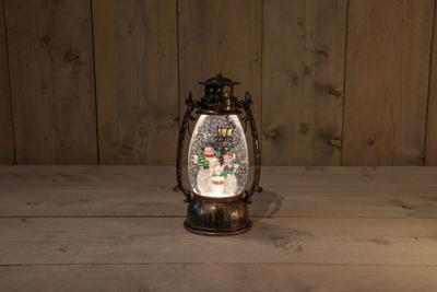 LANTAARN SNEEUWMAN IN GLITTERWATER LED WARM WIT 14,5X24CM 3XAA-DC AANSLUITING - Annas collection