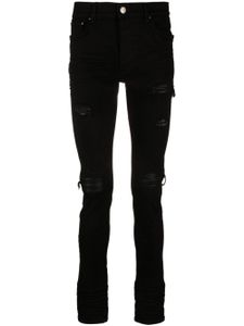 AMIRI jean skinny à effet usé - Noir