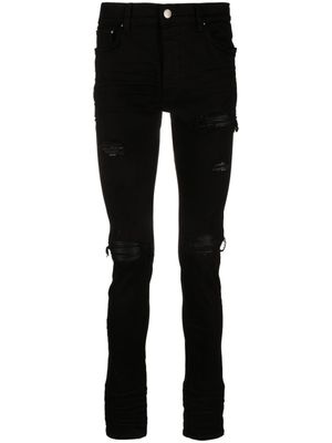 AMIRI jean MX1 skinny à effet usé - Noir