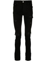 AMIRI jean skinny à effet usé - Noir