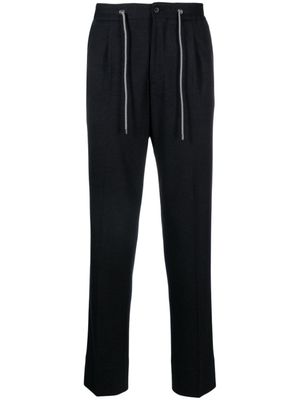 Corneliani pantalon fuselé à lien de resserrage - Bleu