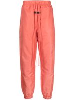 FEAR OF GOD ESSENTIALS pantalon de jogging à patch logo - Rose