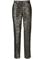 Moschino pantalon slim à logo imprimé - Noir