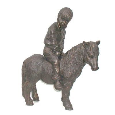 Beeld shetlander met jongentje