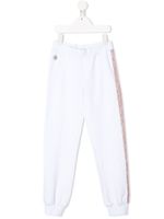 Philipp Plein Junior pantalon de jogging à logo strassé - Blanc
