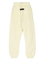 FEAR OF GOD ESSENTIALS pantalon de jogging Ess - Tons neutres