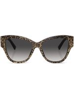 Dolce & Gabbana Eyewear lunettes de soleil à monture papillon - Noir